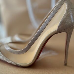 Nude Christian LouBoutin Heel pumps.